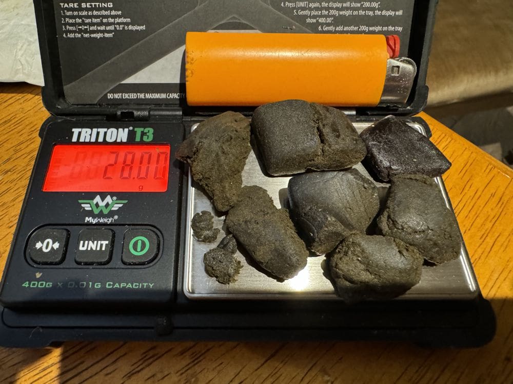 One ounce hash visualization weighed on scale (28 grams)